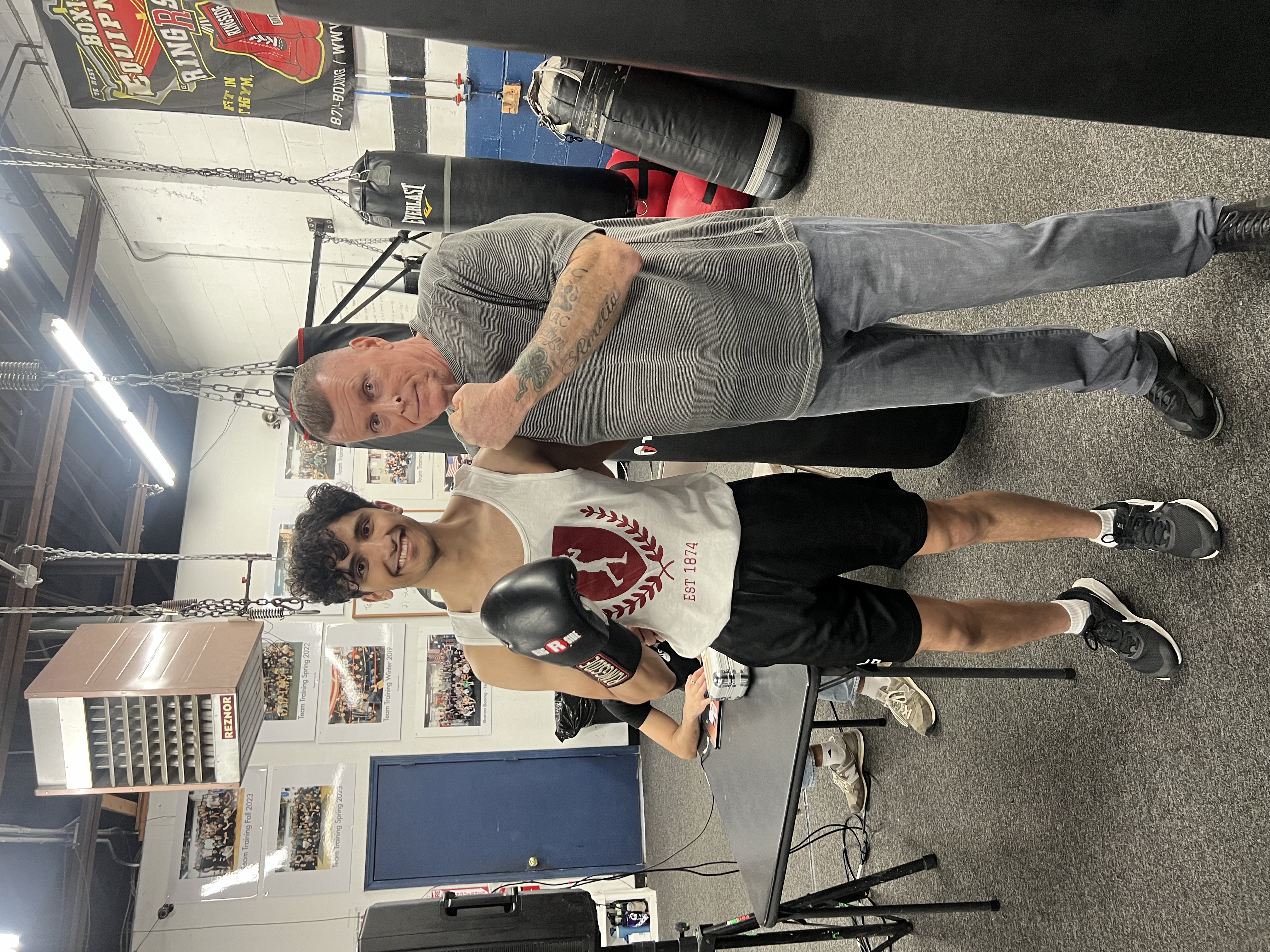 Coach Lake with a boxer